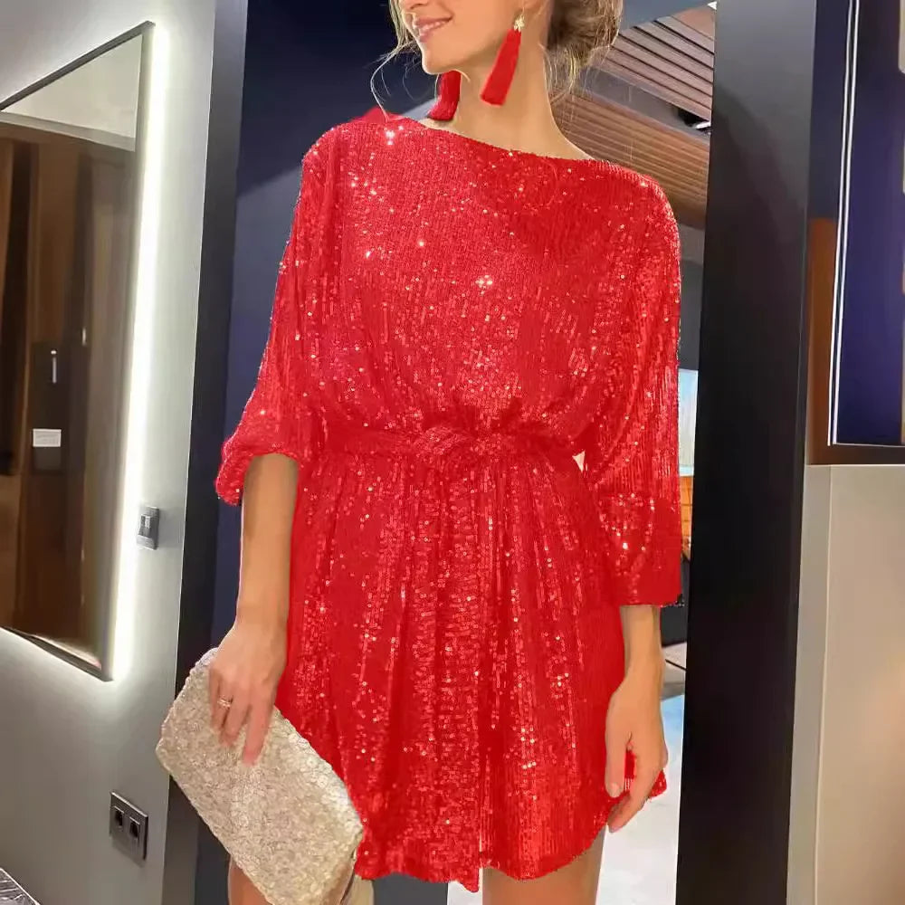 Avondjurk met pailletten en tailleband