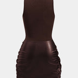 Knoop Voorkant Mouwloze Mini Jurk – Edgy en Elegant in Eén Look