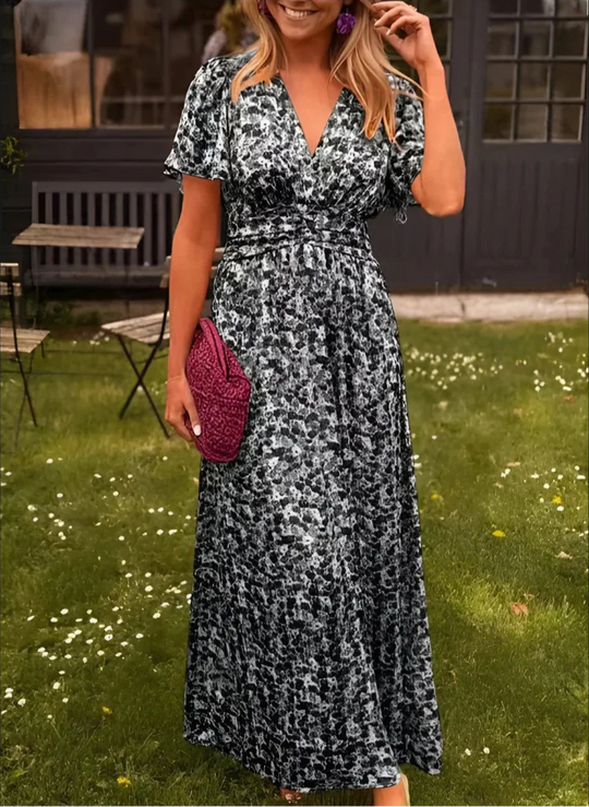 Lange Jurk Dames | Kleurrijke Bloemenprint | Getailleerd & Vloeiende Snit Zomer