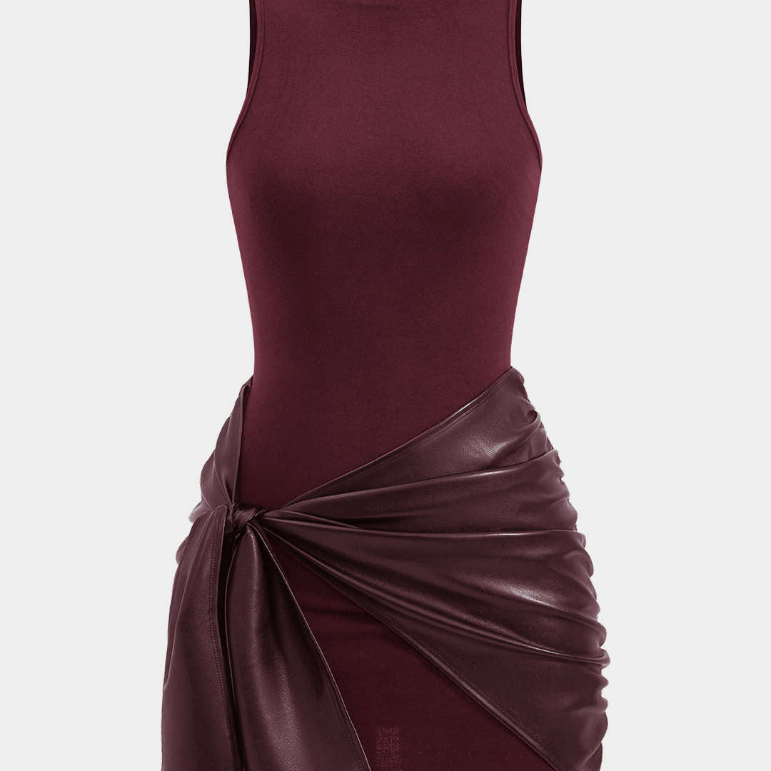 Knoop Voorkant Mouwloze Mini Jurk – Edgy en Elegant in Eén Look