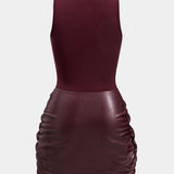 Knoop Voorkant Mouwloze Mini Jurk – Edgy en Elegant in Eén Look