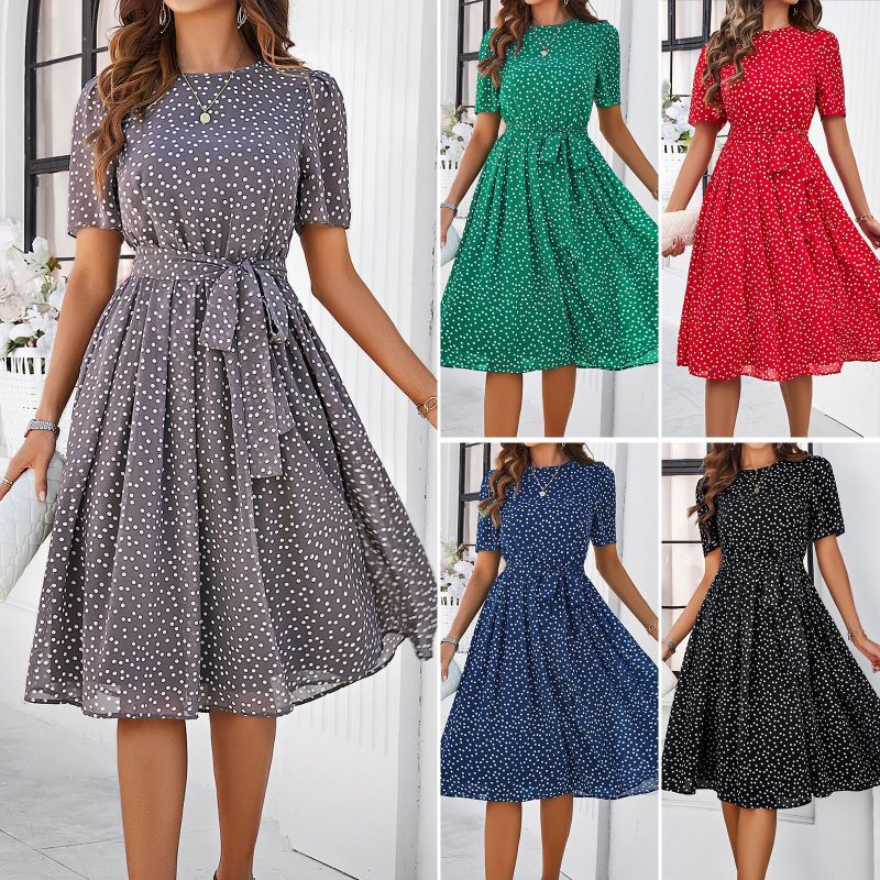 Elegante dames midi jurk met stippen en strik