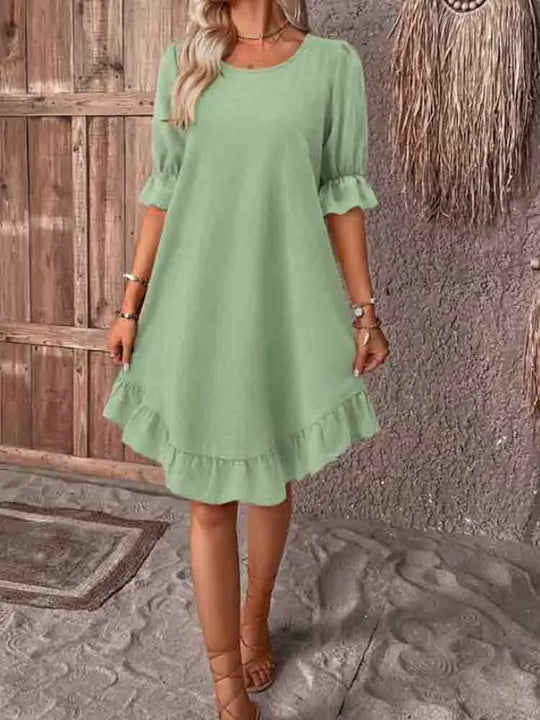 Jurk met ruffles en 3/4 mouwen