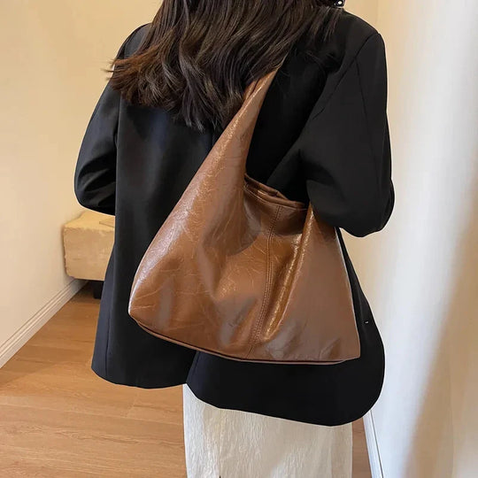 Minimale suède schoudertas