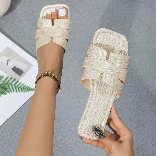 Stijlvolle dames sandalen met platte zool en gekruiste banden