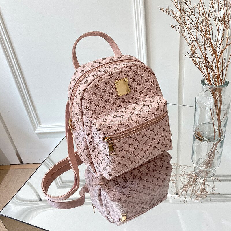 Kleine elegante damesrugzak met een trendy patroon
