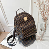 Kleine elegante damesrugzak met een trendy patroon