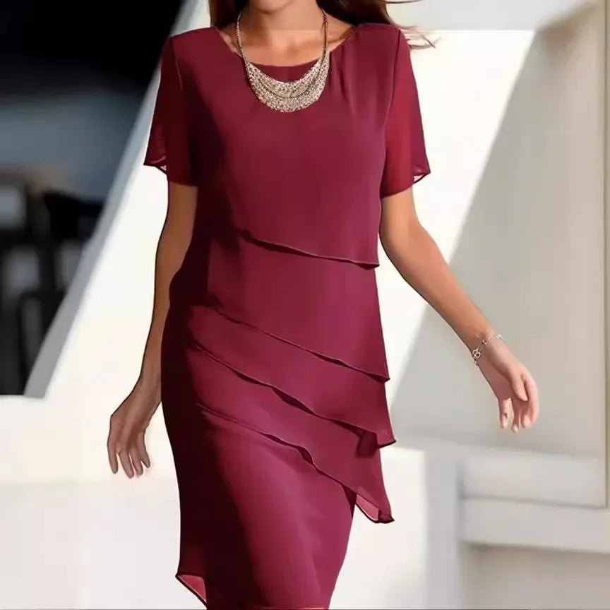 Elegante dameslagenjurk met korte mouwen