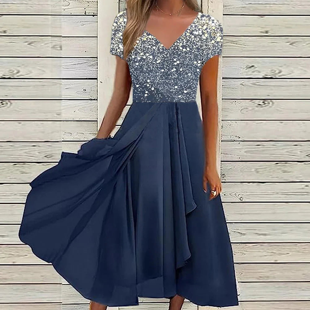 Elegante zomerjurk met kanten bovenstuk en uitlopende rok