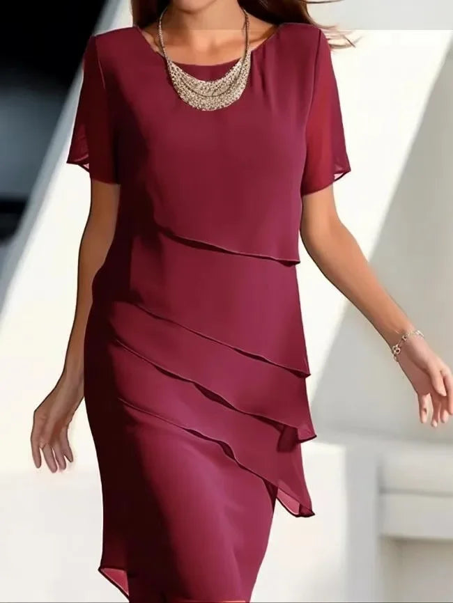 Elegante dameslagenjurk met korte mouwen