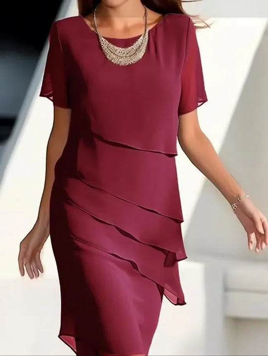 Elegante dameslagenjurk met korte mouwen