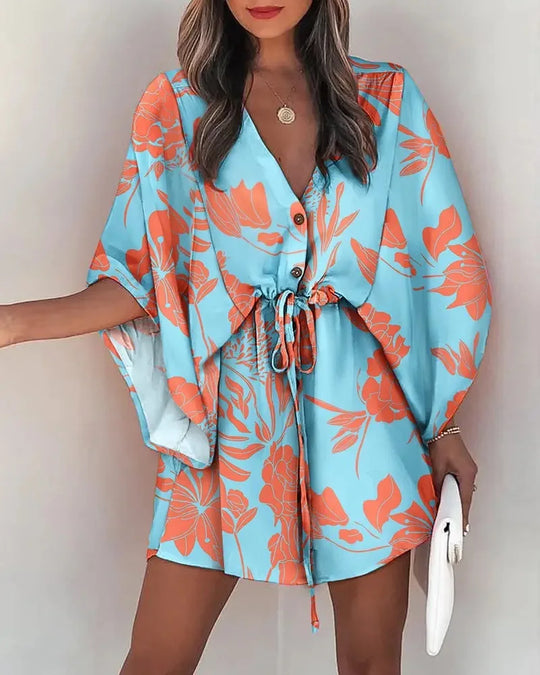 Zomerse jurk met print en brede mouwen