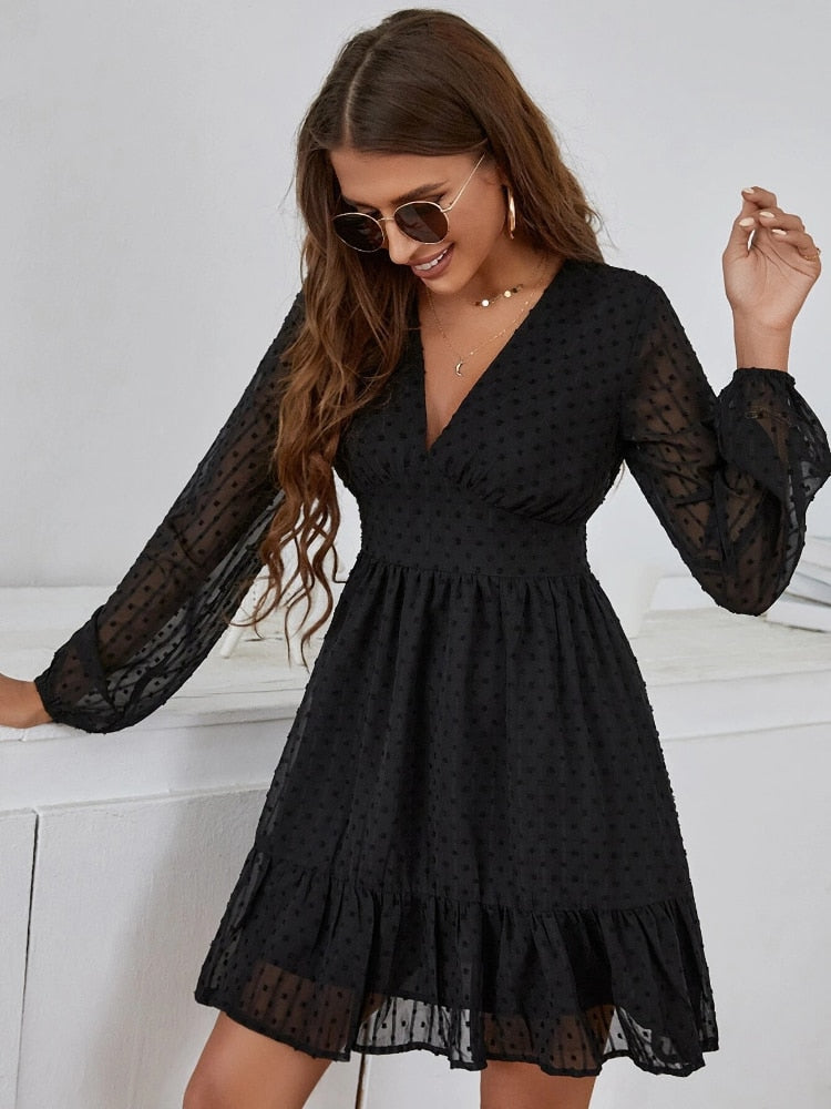 Jurk met Lange, Transparante Mouwen en Ruffles