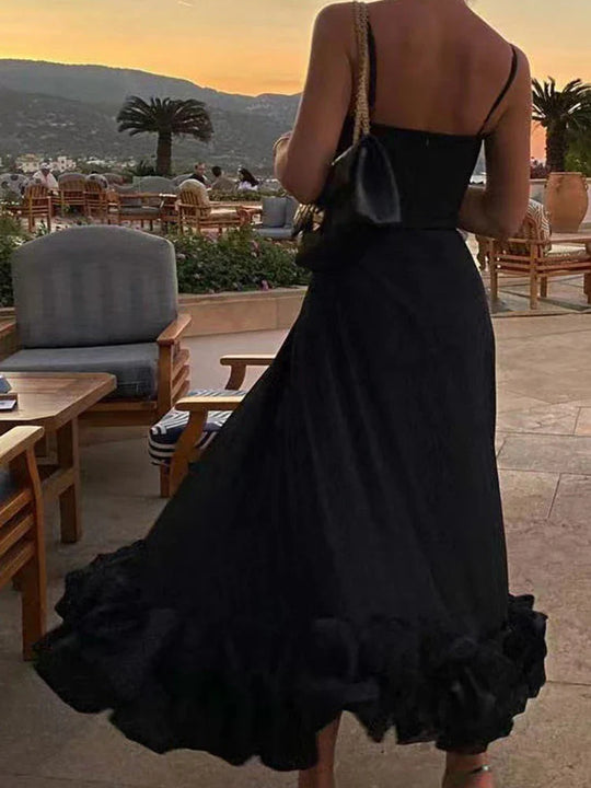Elegante jurk met spaghettibandjes en ruffles
