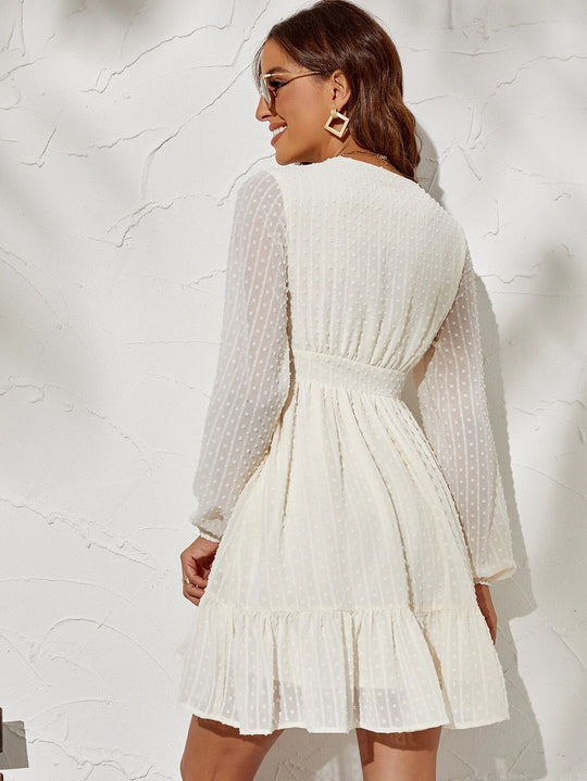 Jurk met Lange, Transparante Mouwen en Ruffles