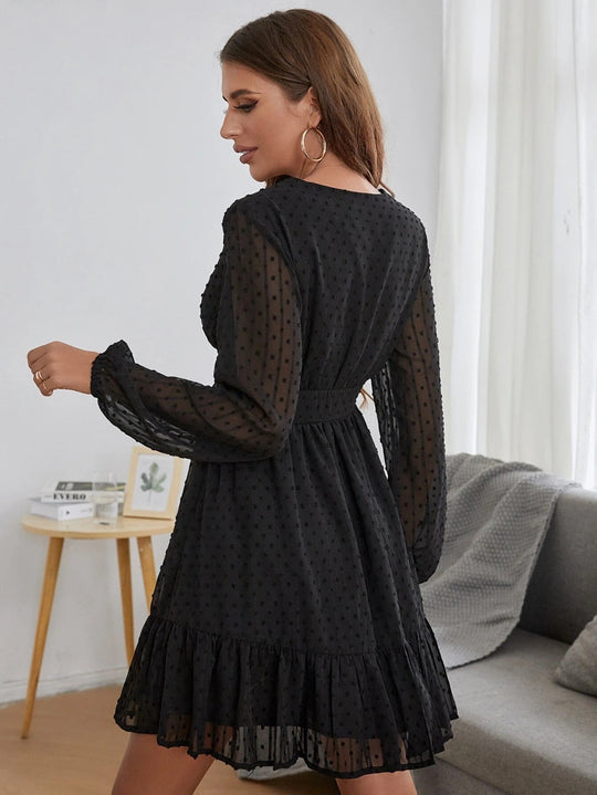 Jurk met Lange, Transparante Mouwen en Ruffles