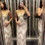 Elegante Maxi-jurk met Kantpatroon en Strik op de Rug