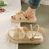 Dames sandalen met strik en decoratieve zool