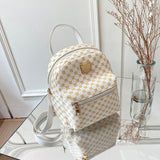 Kleine elegante damesrugzak met een trendy patroon