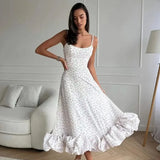 Elegante midi-jurk met spaghettibandjes en ruches