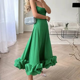 Elegante midi-jurk met spaghettibandjes en ruches