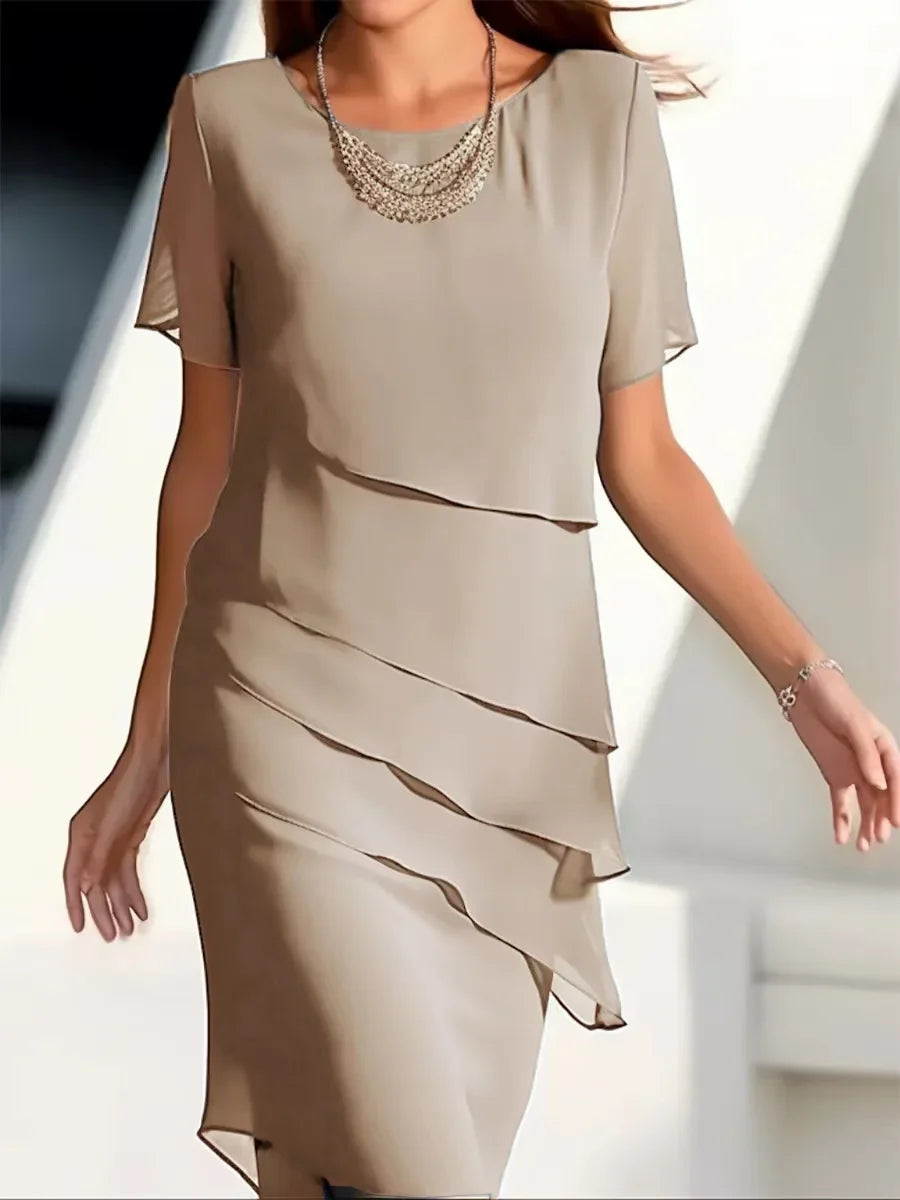Elegante dameslagenjurk met korte mouwen