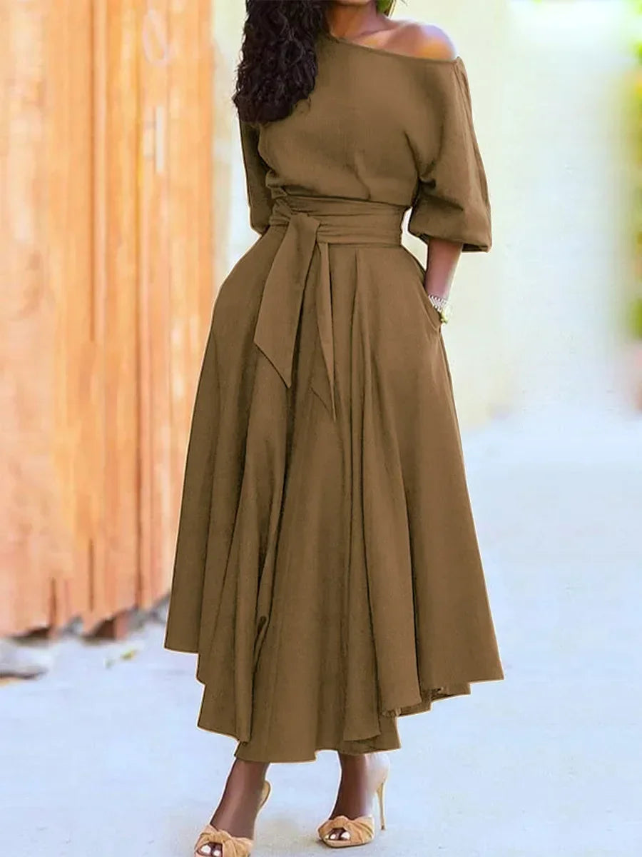Elegante dames midi-jurk met blote schouder en riem