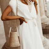 Elegante damesjurk met decoratieve details