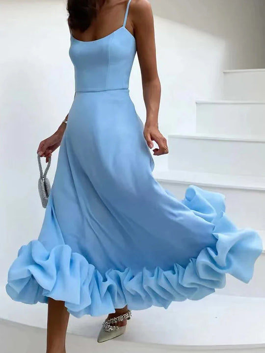 Elegante jurk met spaghettibandjes en ruffles