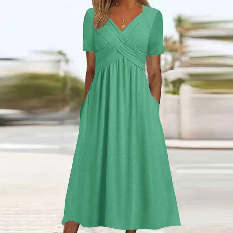 Elegante Midi Jurk met Korte Mouwen en Zakken