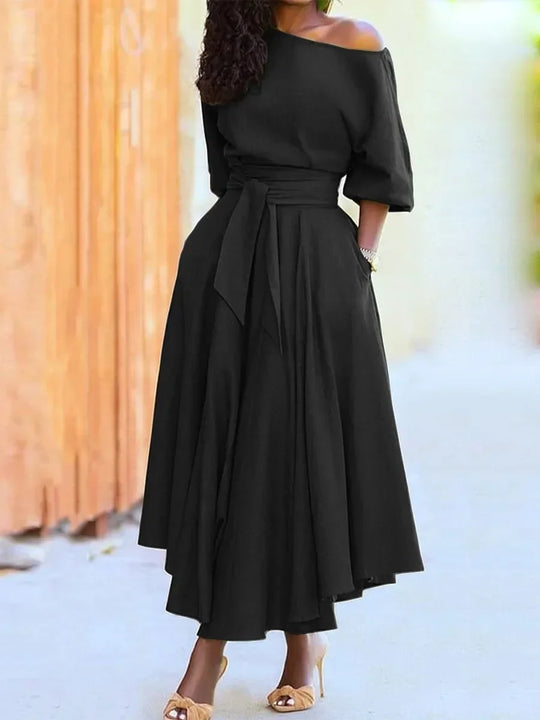 Elegante dames midi-jurk met blote schouder en riem