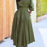 Elegante dames midi-jurk met blote schouder en riem