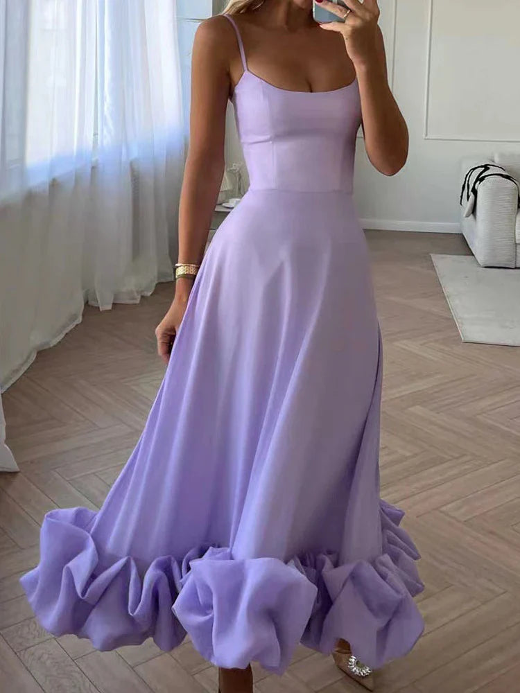 Elegante jurk met spaghettibandjes en ruffles