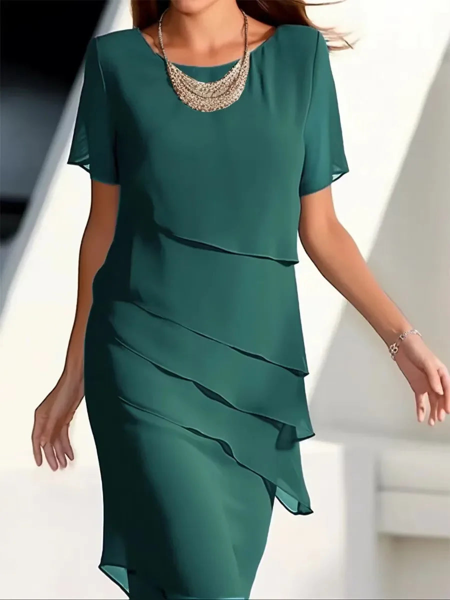 Elegante dameslagenjurk met korte mouwen