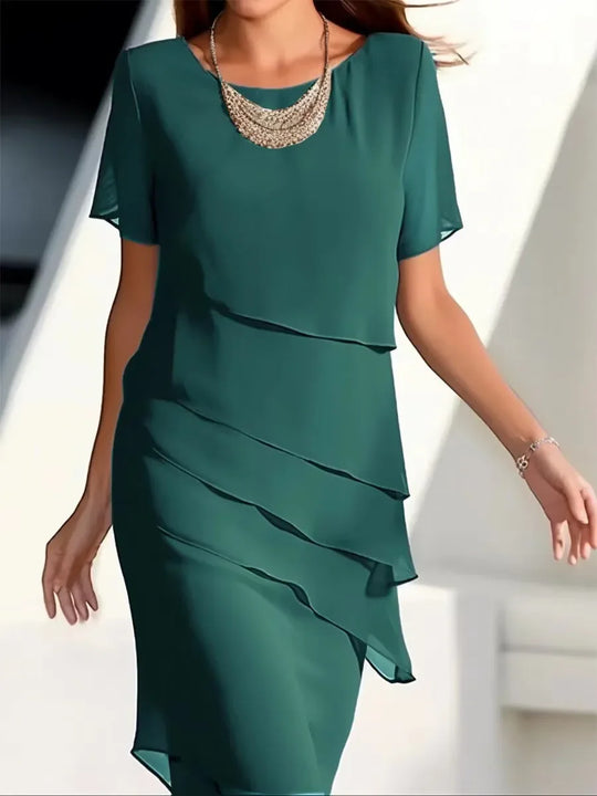 Elegante dameslagenjurk met korte mouwen