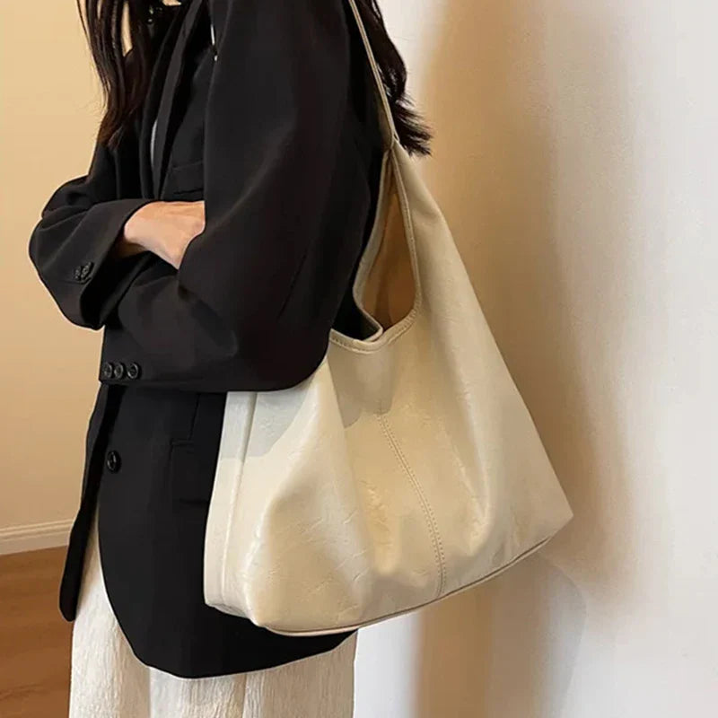Minimale suède schoudertas