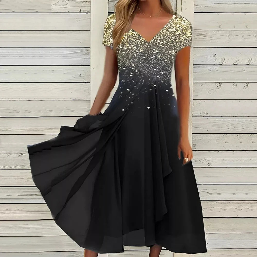 Elegante zomerjurk met kanten bovenstuk en uitlopende rok