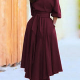 Elegante dames midi-jurk met blote schouder en riem