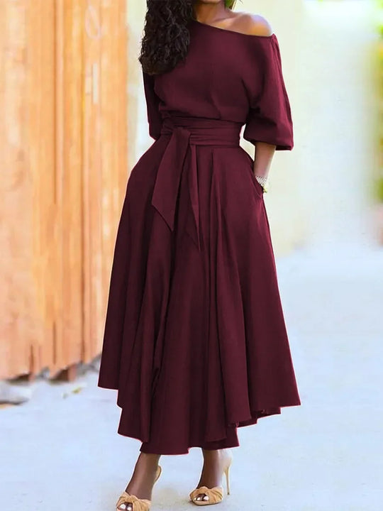 Elegante dames midi-jurk met blote schouder en riem