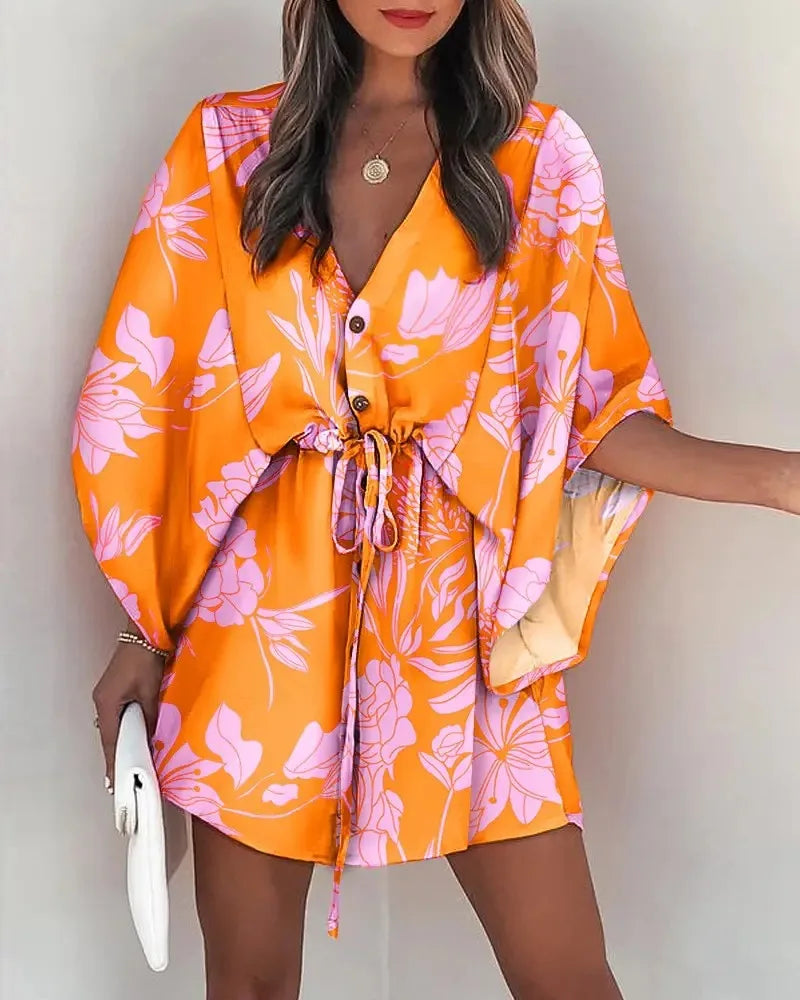Zomerse jurk met print en brede mouwen