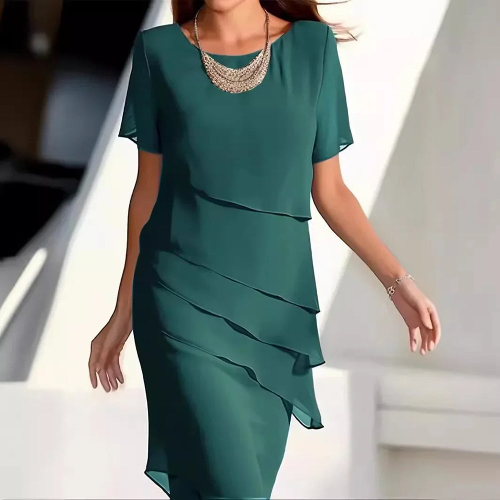 Elegante dameslagenjurk met korte mouwen