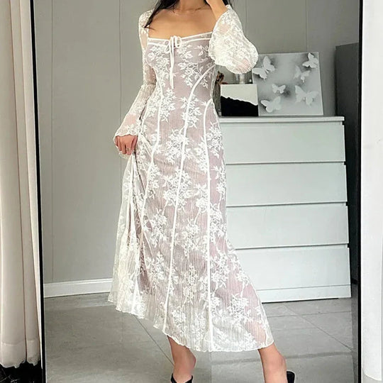 Elegante kanten midi-jurk met lange mouwen