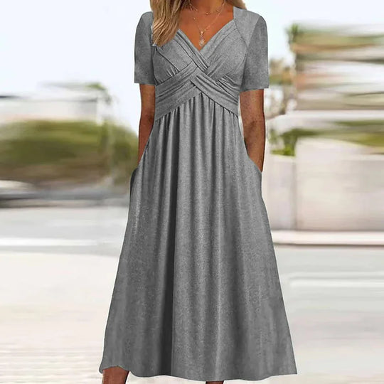 Elegante Midi Jurk met Korte Mouwen en Zakken