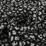 Luchtige Midi-Jurk met V-hals en Subtiele Bloemenprint