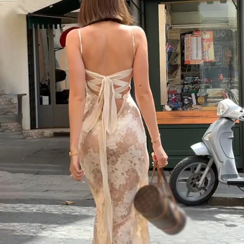 Elegante Maxi-jurk met Kantpatroon en Strik op de Rug