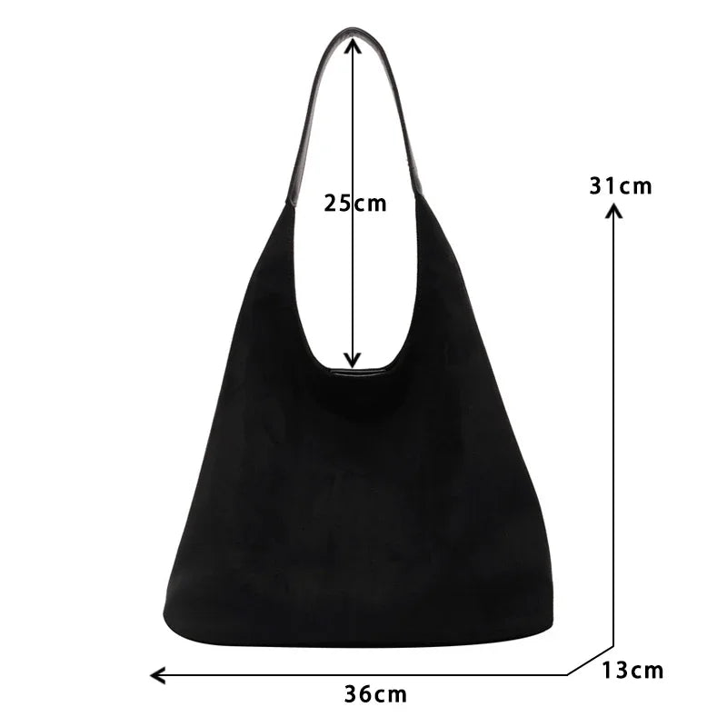 Minimale suède schoudertas