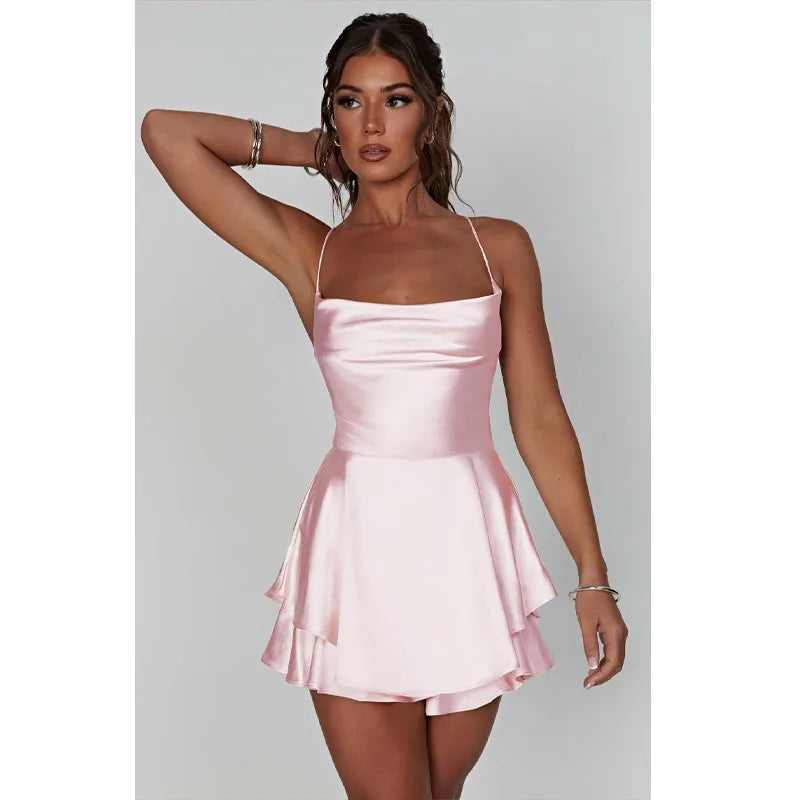 Fijne mini-jurk met open rug en ruffles