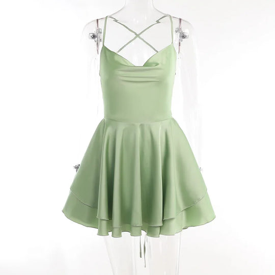 Fijne mini-jurk met open rug en ruffles