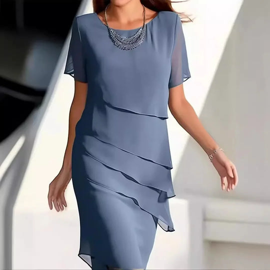 Elegante dameslagenjurk met korte mouwen