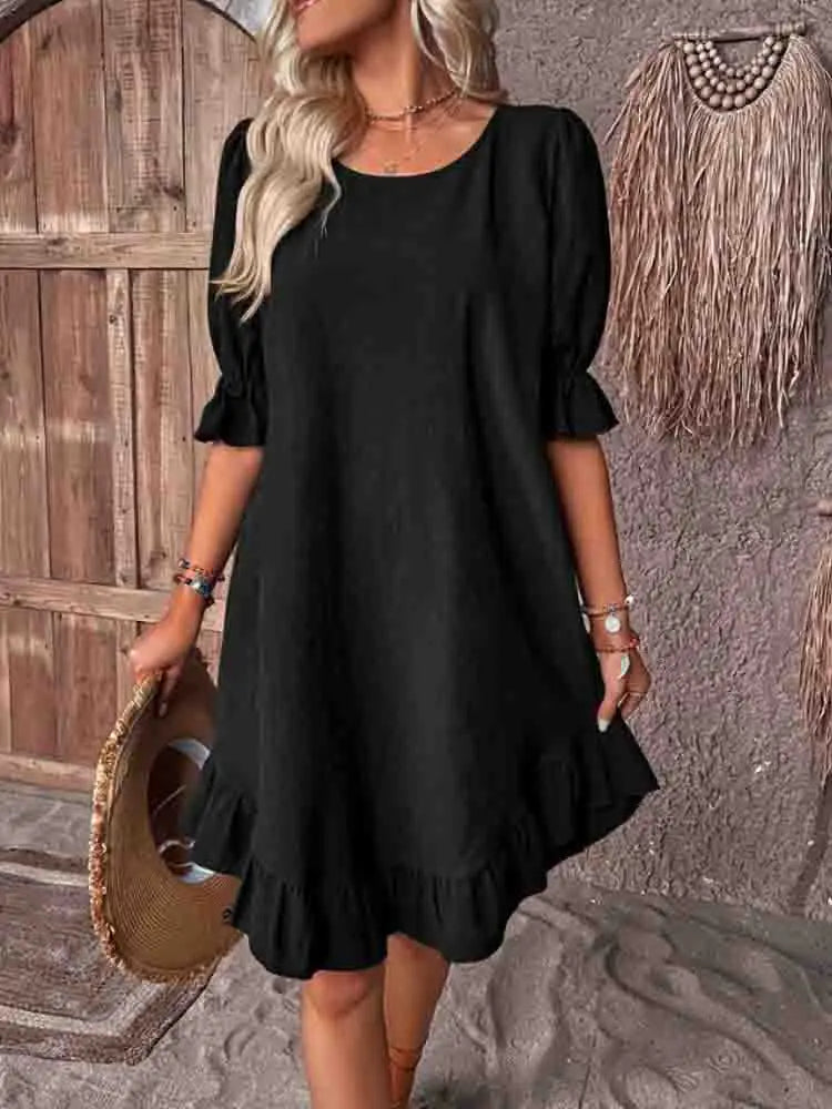 Jurk met ruffles en 3/4 mouwen